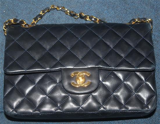 A vintage Chanel dark blue lamb skin quilted handbag,